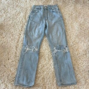 ROLLA’s distressed high rise straight leg jeans.